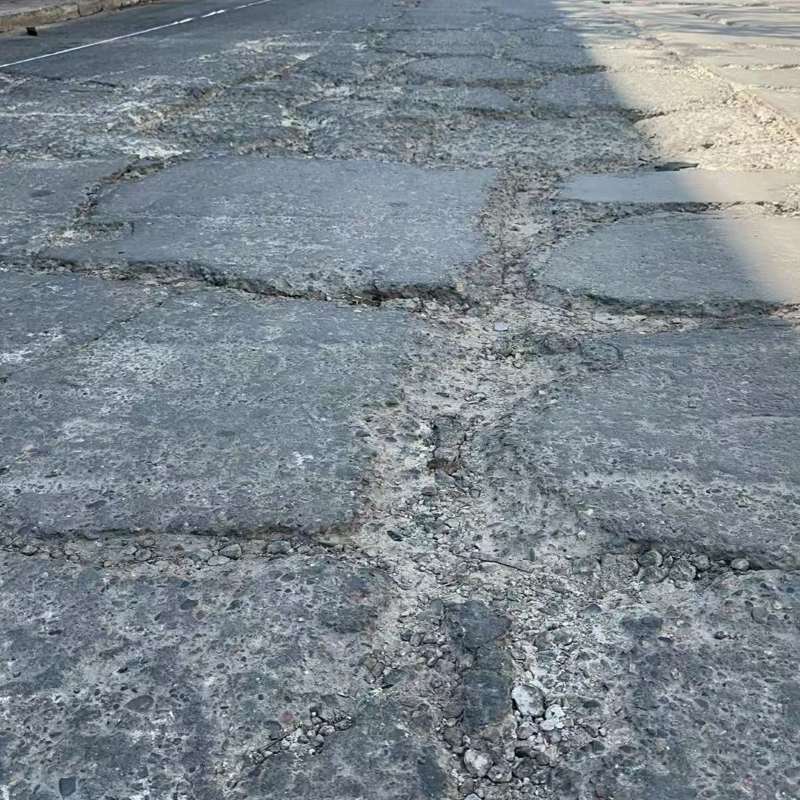 龙山路面起砂露石子修补料